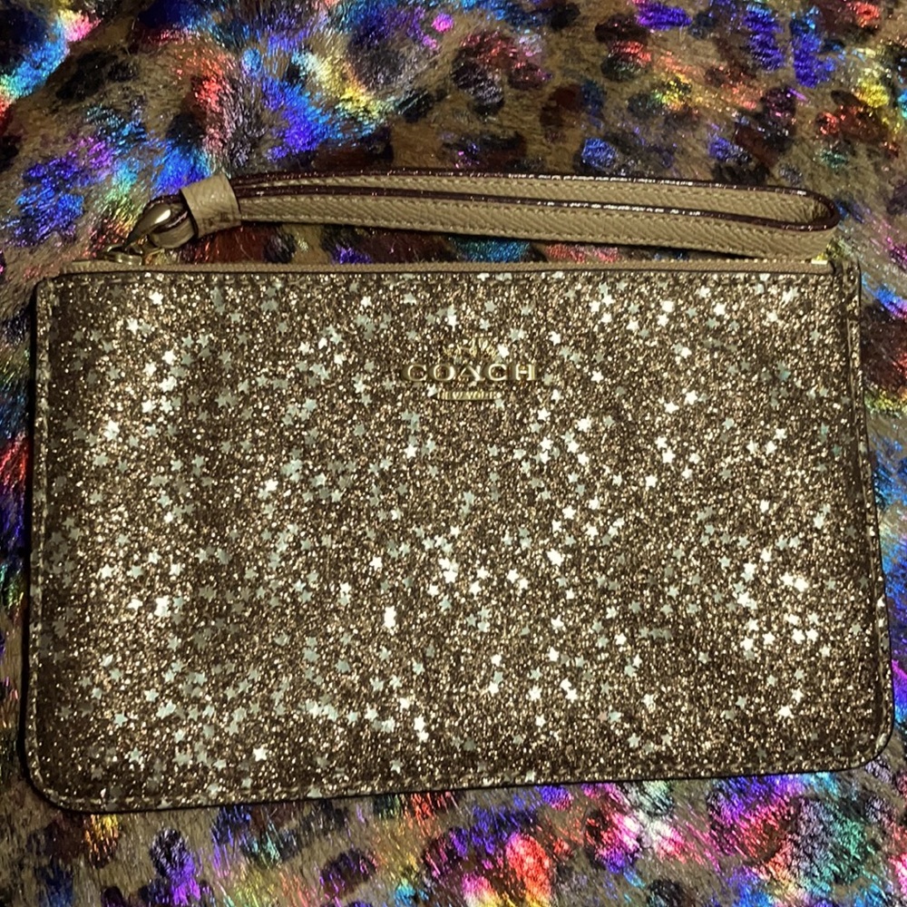 Gold, glittery Coach wristlet